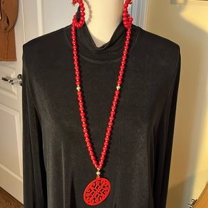 Chicos, necklace, earrings, and three bracelets and red and gold